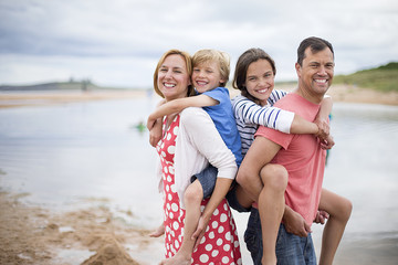 Parents carrying children