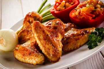 Grilled chicken wings and vegetables 