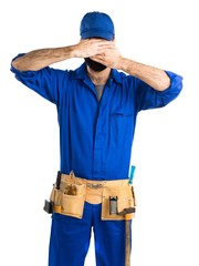 Plumber covering his face