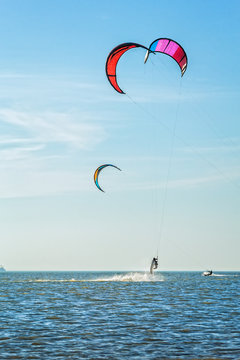 Kite-surfing on the background of sea and sky