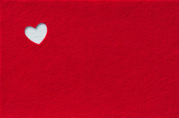 Red felt with heart. Background Valentine's Day