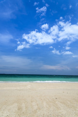 Fototapeta na wymiar SAND BEACH AND BLUE SEA - tropical sea, thailand