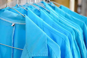 Blue Collar Jackets Hanging On A Line