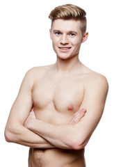 Naklejka premium Young shirtless man isolated on white