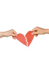 Couple holding broken heart