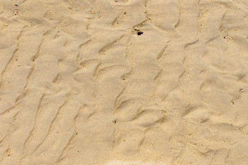 Sand pattern on tropical beach, thailand  (sand on the coast)
