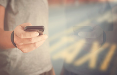 Person Booking Taxi On Smart Phone