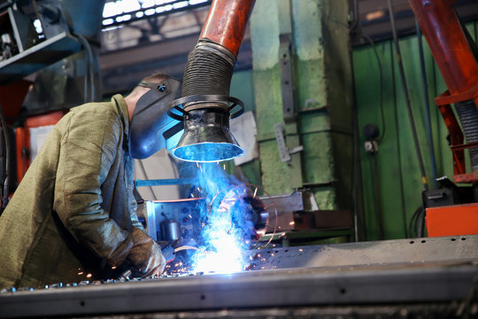 Factory welding works with industrial extractor fan