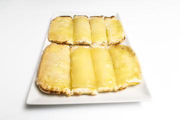 Tostada de queso curado y mantequilla