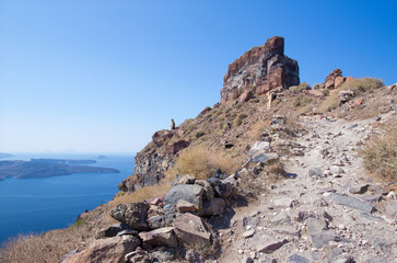 Fototapeta na wymiar Santorini - The look to Skaros castle with the Nea Kameni island in the backgroud.