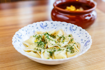 Russian traditional product - dumplings with meat.