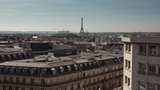 Roofs of Paris with Eiffel Tower and blue sky - 1080p. The famous roofs of Paris with the Eiffel Tower - Full HD