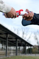 Student receiving his diploma