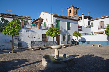 GRANADA, SPAIN - MAY 31, 2015: Little squer of Albazyin Plazeta Carniceros.