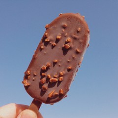 chocolate lolly against blue sky
