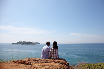 Young couple by the sea