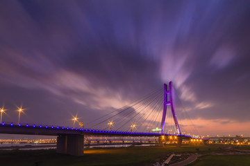 Sunset view of New Taipei Bridge