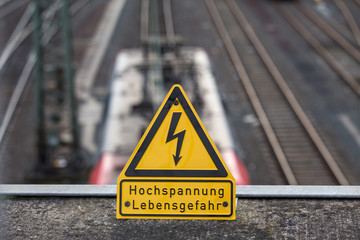 german high voltage train power line sign
