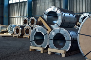 rolls of steel sheet in a warehouse