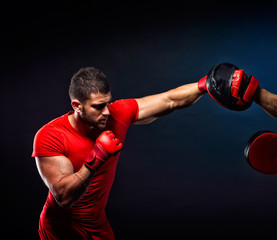 Plakat personal trainer man coach and man exercising boxing in the gym