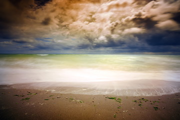 seascape on cloudy summer day - long exposure image