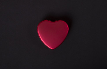 Obraz premium red heart on black