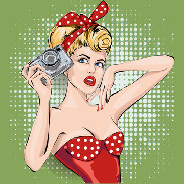 Pin-up sexy woman with camera taking pictures