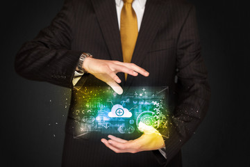 Businessman holding data cloud