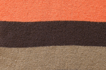 Fototapeta premium Striped woolen scarf background texture