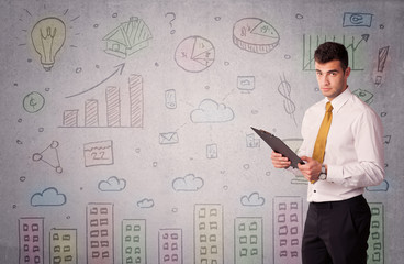 Colorful drawings on wall with businessman