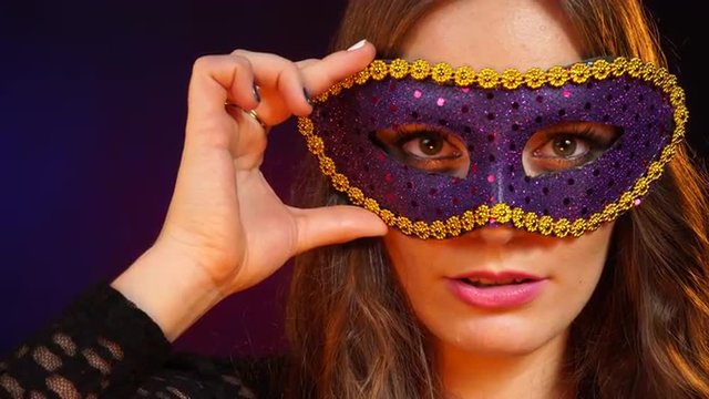 Woman face with carnival mask 4K