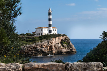 Fototapeta na wymiar Malerischer Leuchtturm von Portocolom, Mallorca
