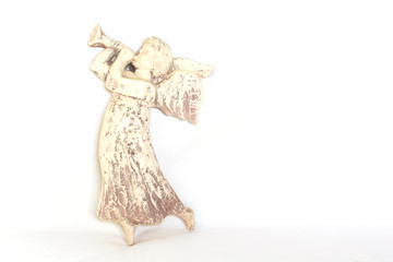Figurine of angel on white background