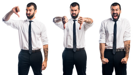 Businessman doing bad signal