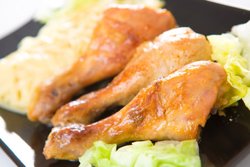 fried chicken and macaroni on a plate