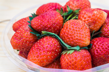 Strawberries on wooden background