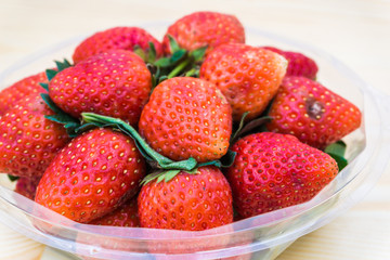 Strawberries on wooden background