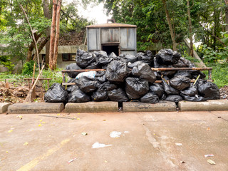 Garden incinerator with black bags