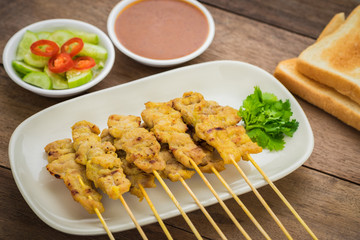 Grilled pork satay with peanut sauce and toast, Thai food