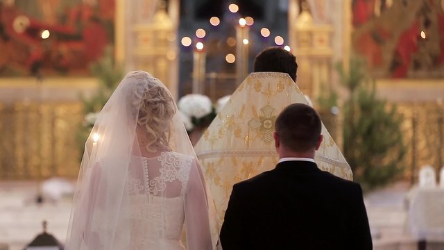 Bride and groom at the church during a wedding ceremony
