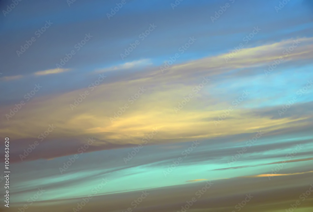 Wall mural abstract background with bokeh defocused beautiful flame clouds in the sky