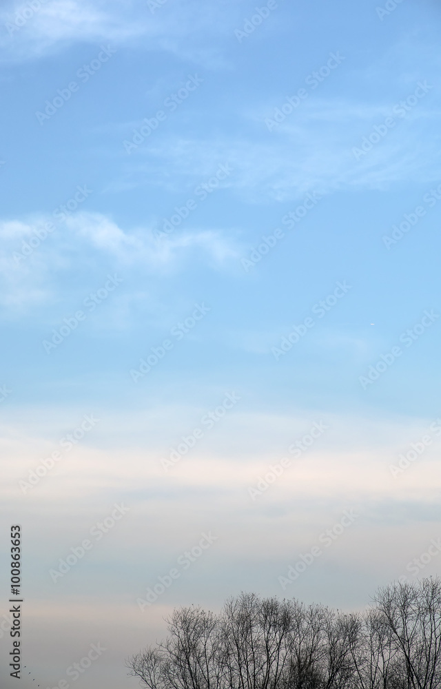 Wall mural abstract background with bokeh defocused beautiful flame clouds in the sky