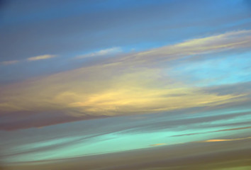 abstract background with bokeh defocused beautiful flame clouds in the sky
