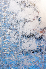 frosty pattern on edge of a frozen window