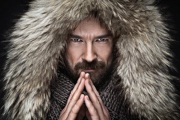 Portrait of man with beard in winter clothes - 100865888
