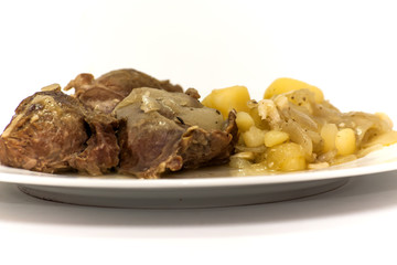 Tasty Pork cheeks with potatoes