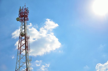 Telecommunication mast TV antennas wireless technology with blue sky in the morning
