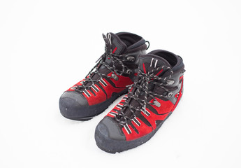 Climbing shoes red for difficult winter hikes.