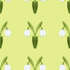 Vector seamless pattern with snowdrop,
spring flower. Background for your design, greeting cards