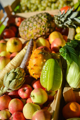 Mixed fruits and vegetables on market stall
